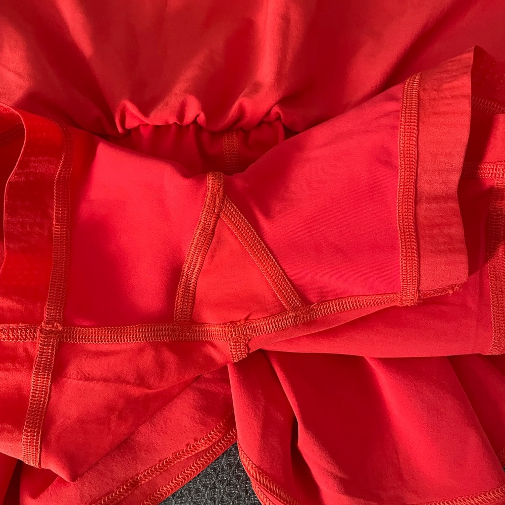 Lululemon Court Rival 14” Skirt in a vibrant Coral color - Picture 9 of 12